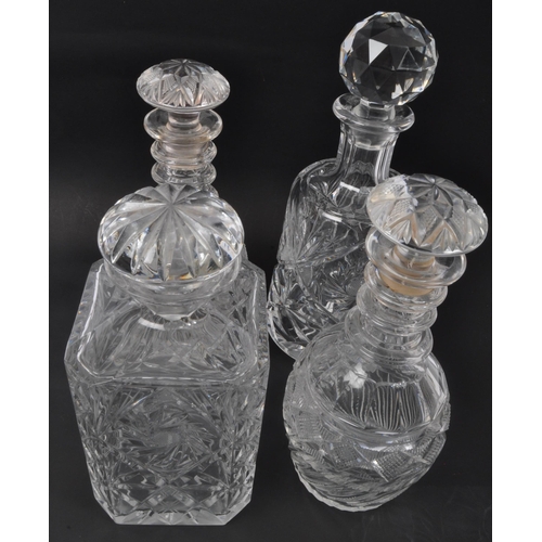 175 - A collection of vintage 20th Century glass alcohol decanter / jugs / receptacles. Four together with... 