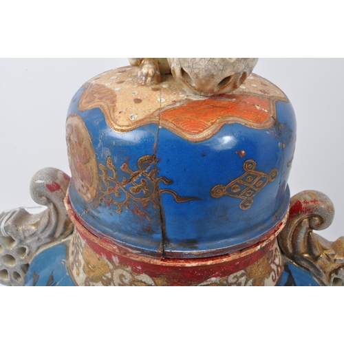 188 - A 19th century Japanese Meiji period satsuma ware vase. The vase having lid with finial modelled in ... 