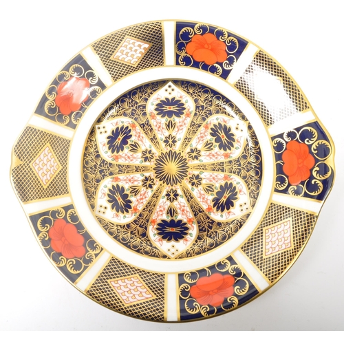 19 - A contemporary 2002 Royal Crown Derby china dessert / cake plate with side handles in the Old Imari ... 