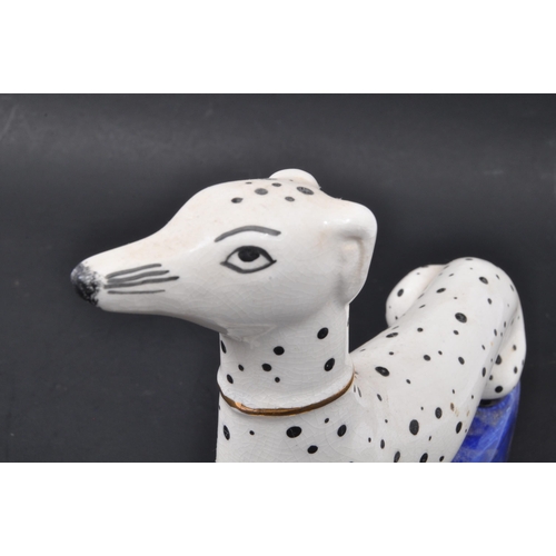 190 - A pair of 19th century Victorian Staffordshire Dalmatians dog figures sitting upon cobalt plinth bas... 