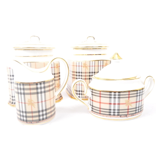 192 - A assorted set of contemporary Burberry's fine bone china breakfast set comprising of two biscuit / ... 