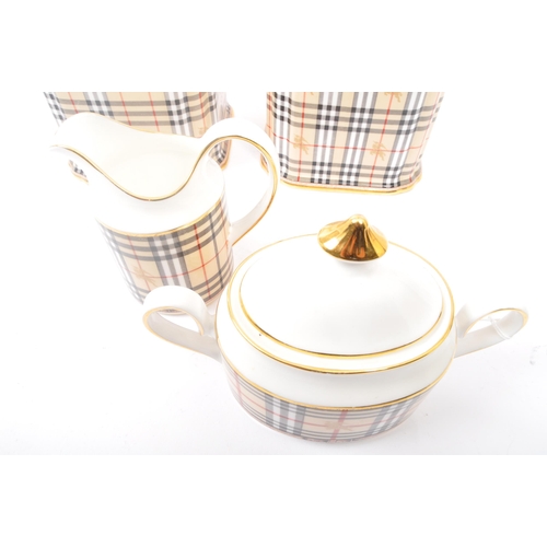 192 - A assorted set of contemporary Burberry's fine bone china breakfast set comprising of two biscuit / ... 