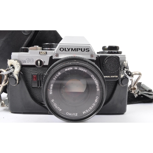 212 - A retro vintage 20th century Olympus OM10 camera. Made in Japan. Olympus OM - System Zuiko Auto-S 50... 