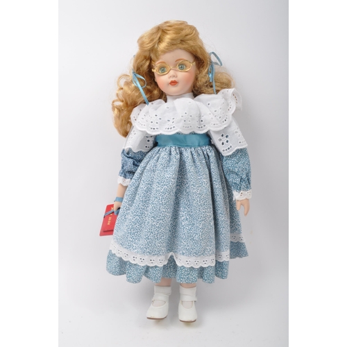 218 - A collection of vintage 20th century porcelain dolls. Victorian Impex Corp, The Classique Collection... 