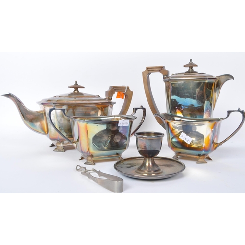 226 - An early 20th century English silver plated tea service comprising of tea pot, coffee pot, sugar bow... 