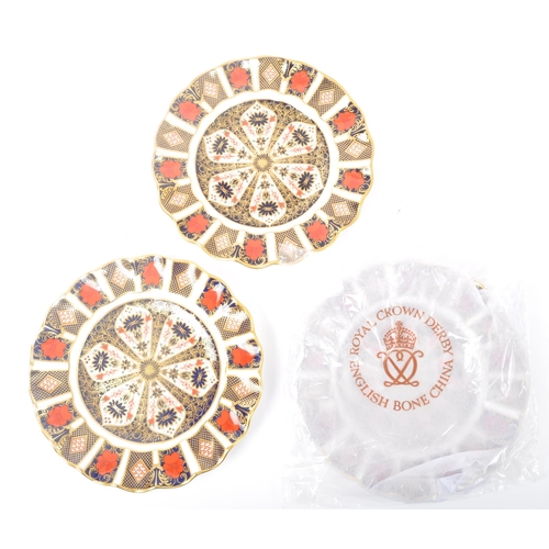 23 - A set of three contemporary 2004 Royal Crown Derby china dessert plates in the new Old pattern. The ... 