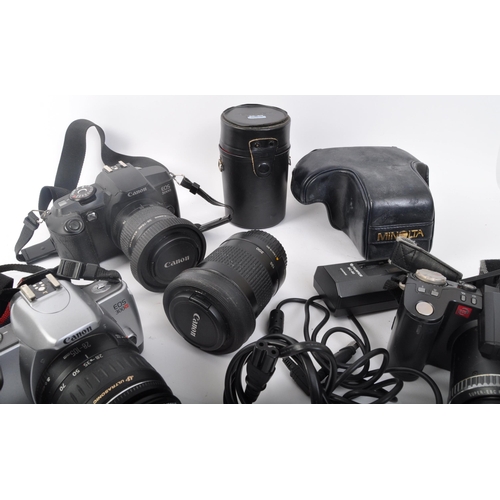 239 - An assortment of retro vintage 20th century photographic equipment. The lot to include a Canon EOS 3... 