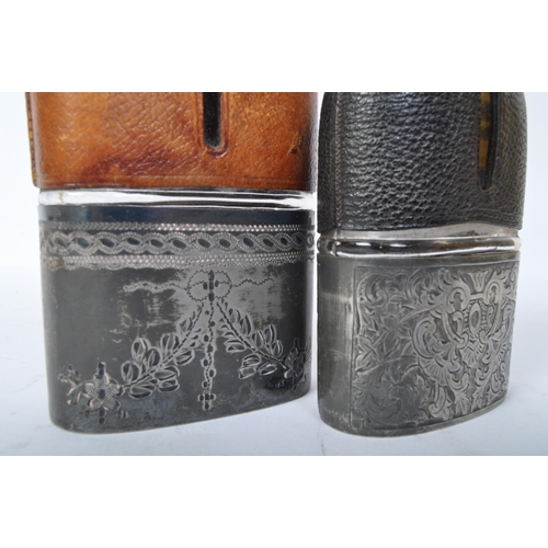 241 - Two 19th century Victorian silver plate and glass gents hip flaks with engraving to base. Measures 1... 