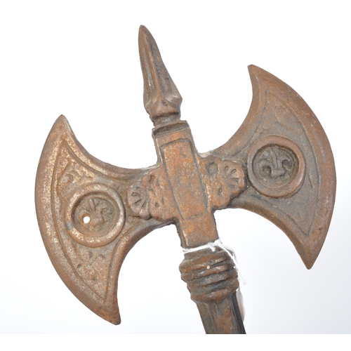 247 - A 20th century cast metal double bit axe decorated with heraldic fleur de lys and palmette motifs. M... 