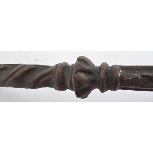 247 - A 20th century cast metal double bit axe decorated with heraldic fleur de lys and palmette motifs. M... 