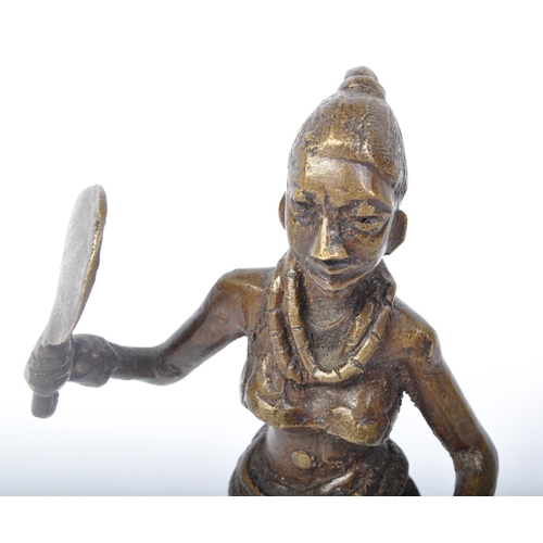 255 - A 20th Century vintage bronze statue figurine. Of a tribal African woman, with bead decoration and r... 