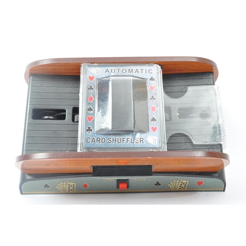 276 - A automatic casino card shuffler for poker or other card games. Shuffles one or two decks. Battery o... 