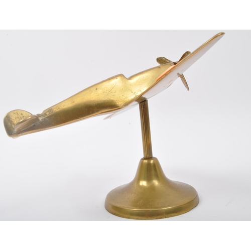 280 - A 20th century WWI World War One style brass spitfire aeroplane figure having articulated propellar ... 