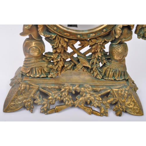 286 - A 20th century gilt metal table top mirror having pierced heraldic decoration to frame with crown, k... 