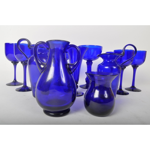 29 - A collection of vintage 20th Century Bristol Blue glass, Comprising of; vases, stem drinking wine gl... 