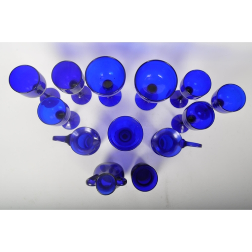 29 - A collection of vintage 20th Century Bristol Blue glass, Comprising of; vases, stem drinking wine gl... 