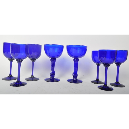 29 - A collection of vintage 20th Century Bristol Blue glass, Comprising of; vases, stem drinking wine gl... 