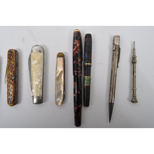 294 - Two 20th century fountain pens with 14ct gold nibs, an assorted collection of fruit knives as well a... 