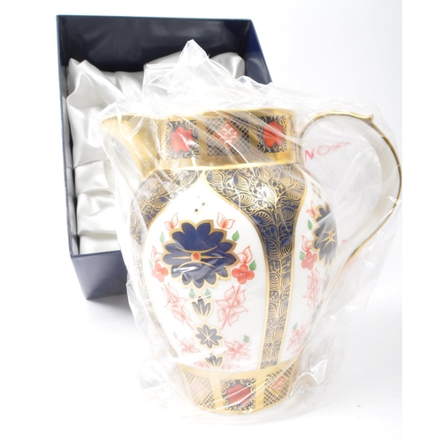 3 - A contemporary 2003 Royal Crown Derby china serving Rolleston / Carsington jug with handle in the Ol... 