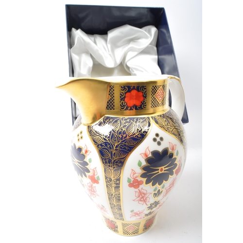 3 - A contemporary 2003 Royal Crown Derby china serving Rolleston / Carsington jug with handle in the Ol... 