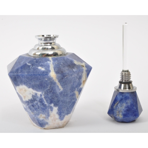 302 - A vintage 20th century lapis lazuli faceted carved scent perfume bottle. The bottle having faceted s... 