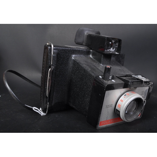 311 - An original 1980's Polaroid Colorpack 80 Land Camera. The camera complete and in the original packin... 