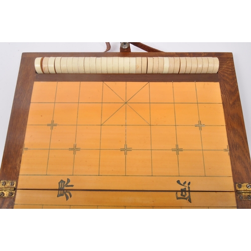 318 - A vintage retro mid 20th century circa. 1960's Chinese chess Xiangqi 'elephant chess' travel board g... 