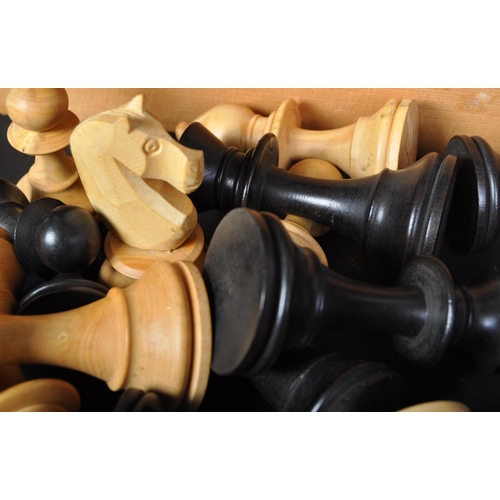 320 - A retro vintage 20th century K & C Ltd Chessmen chess pieces in wooden box with sliding top. The box... 