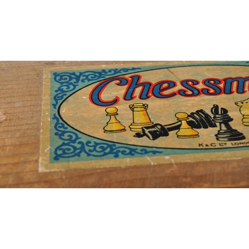 320 - A retro vintage 20th century K & C Ltd Chessmen chess pieces in wooden box with sliding top. The box... 