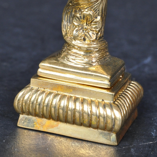 325 - A 20th century Art Nouveau style brass desk seal in the shape of a lady's head. The base decorated w... 