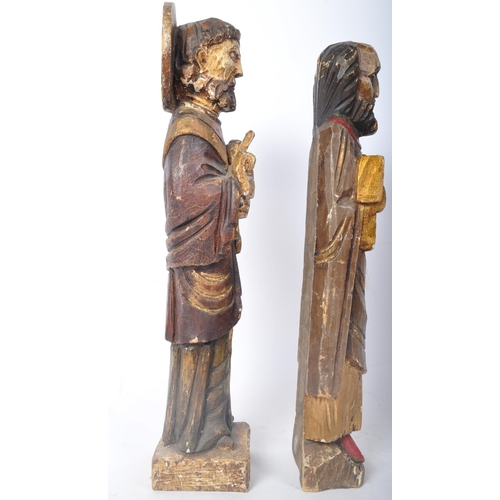 327 - Two 20th century Russian orthodox carved wood hand painted figures to depict St Peter holding keys t... 