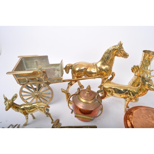 329 - A collection of 20th Century brass wares. To include; nut roaster, horse & cart, stags, companion se... 