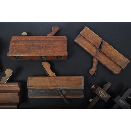 334 - A collection of 20th century wooden carpenters planes tools to include G. Fleming C. H,. Berry, J. P... 