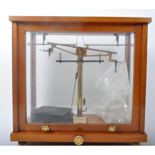 339 - A vintage mid 20th century circa 1960s Philip Harris Ltd precision scale cased in oak & glass displa... 