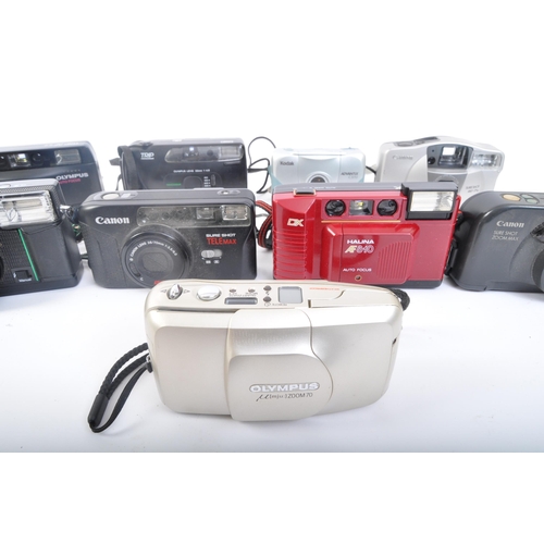 349 - An assortment of retro vintage 20th century photographic cameras. The lot comprising of a Canon Sure... 