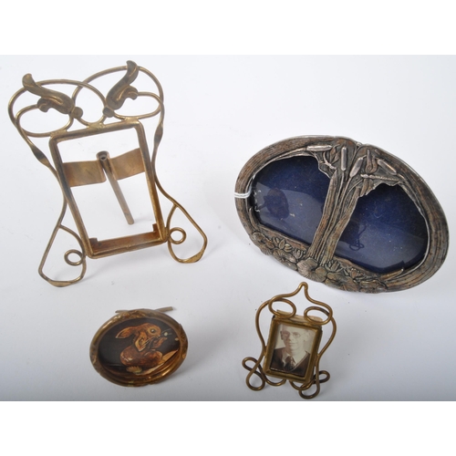 353 - A collection of vintage 20th Century miniature brass picture frames. One Art Nouveau style in oval f... 