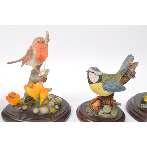 359 - A collection of four Country Artists Stratford upon avon bird figurines. Including; CA 511 blue tit,... 