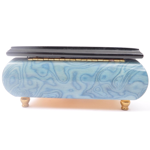 366 - An Italian musical jewellery box. With the tune Fur Elise with a decorated floral top, hinged lid op... 