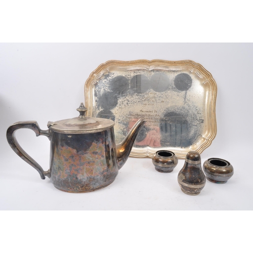 374 - An assortment of early 20th century silver plated items to include tray, wine coaster, an Embassy te... 