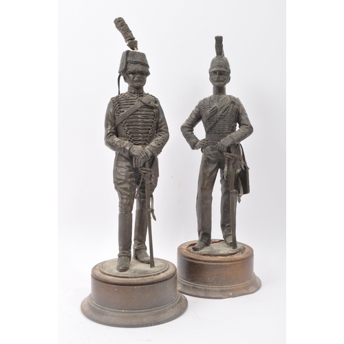 375 - A pair of 20th century bronzed effect resin Napoleonic figures together with two bronze horse figure... 