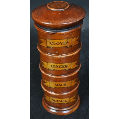 376 - A 20th century George III style fruitwood four section spice tower. The tower having a nutmeg, mace,... 