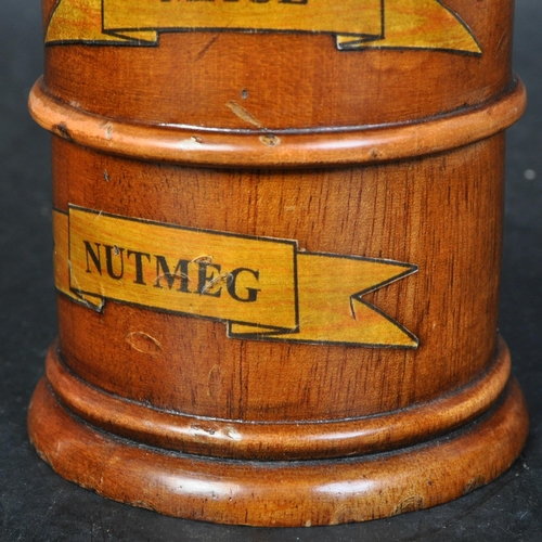 376 - A 20th century George III style fruitwood four section spice tower. The tower having a nutmeg, mace,... 