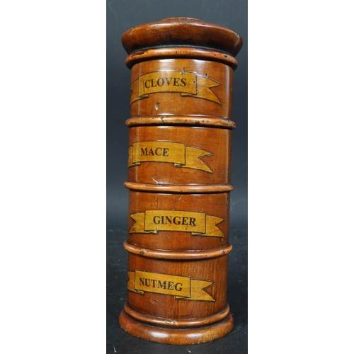 376 - A 20th century George III style fruitwood four section spice tower. The tower having a nutmeg, mace,... 