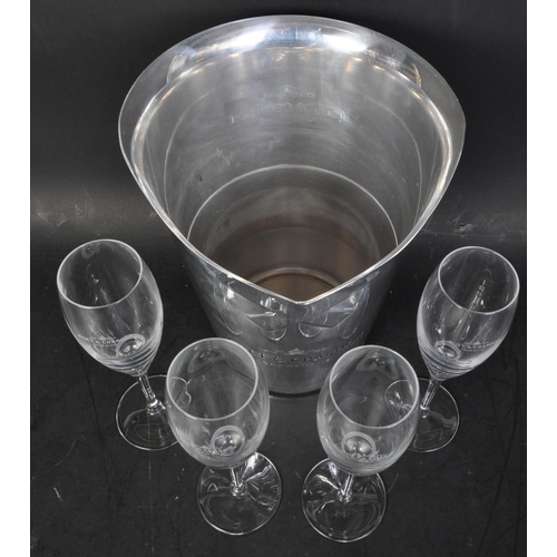 378 - A 20th century silver plated Moet & Chandon champagne bucket with six matching flute glasses. The bu... 