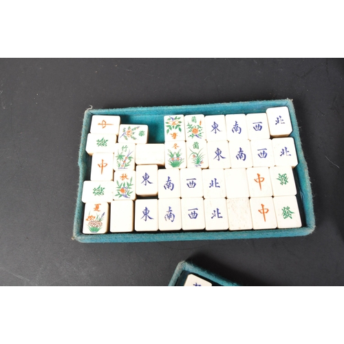 382 - A 20th Century circa 1930's Chinese Mah-jong set. With bone and bamboo counters worn leather case an... 