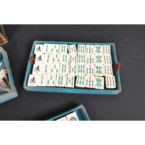 382 - A 20th Century circa 1930's Chinese Mah-jong set. With bone and bamboo counters worn leather case an... 