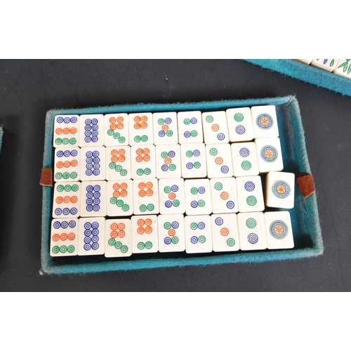 382 - A 20th Century circa 1930's Chinese Mah-jong set. With bone and bamboo counters worn leather case an... 