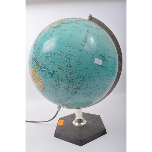 389 - A 1970's retro Danish light up illuminating desktop Scan Globe. The globe set to a black hexagonal b... 