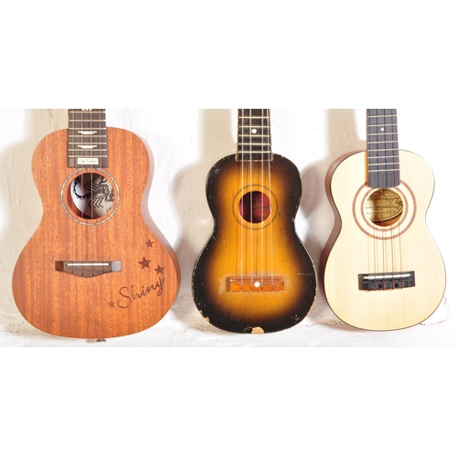 390 - Three retro vintage ukuleles. The lot to include a Abarth & Co, Torino 'Aloha' ukulele, a The Ozark,... 