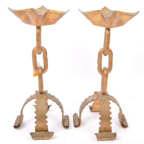 393 - A pair of mid 20th century Brutalist style gilded metal hand soldered candlesticks in the manner of ... 